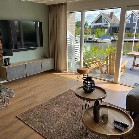 Vakantiehuis Aan Het Water Indijk Bagian luar foto