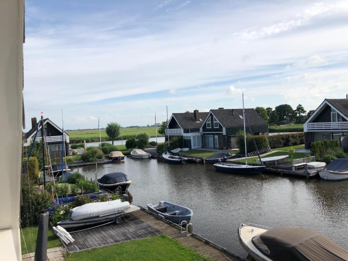 Vakantiehuis Aan Het Water Indijk Bagian luar foto