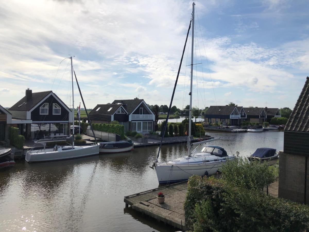 Vakantiehuis Aan Het Water Indijk Bagian luar foto