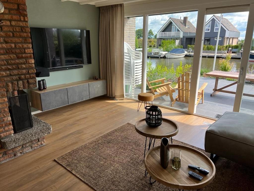 Vakantiehuis Aan Het Water Indijk Bagian luar foto